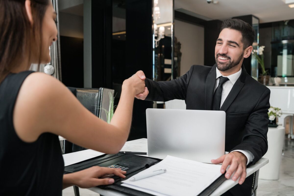 man and woman handshake